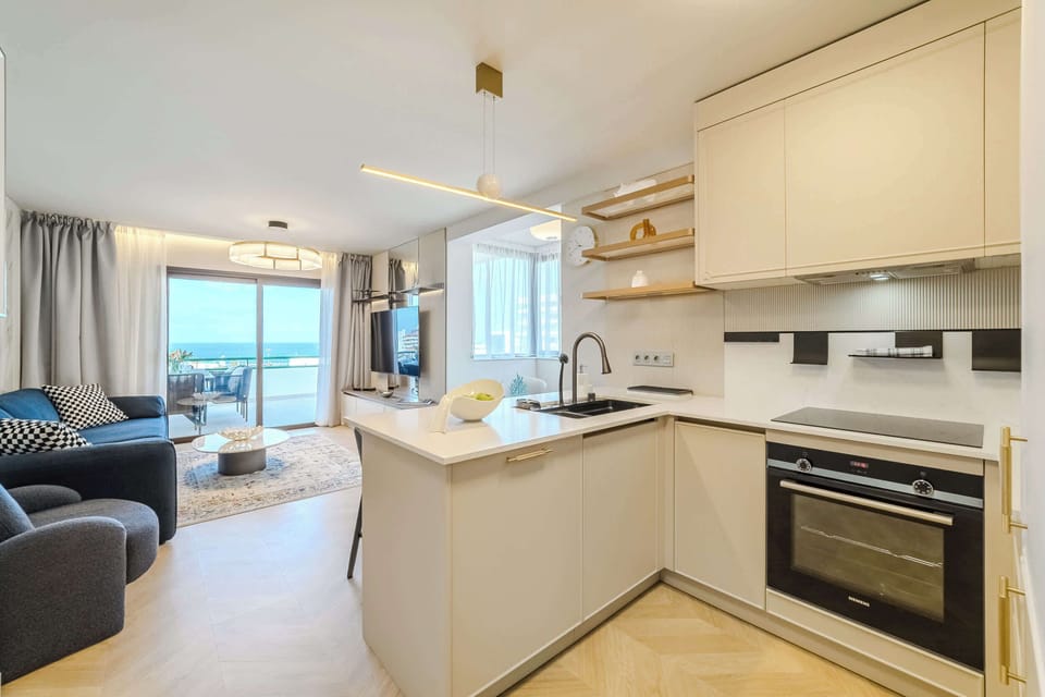 Bright Kitchen Corner with Bar Seating – Perfect Spot for Coffee & Conversation in Your Suite