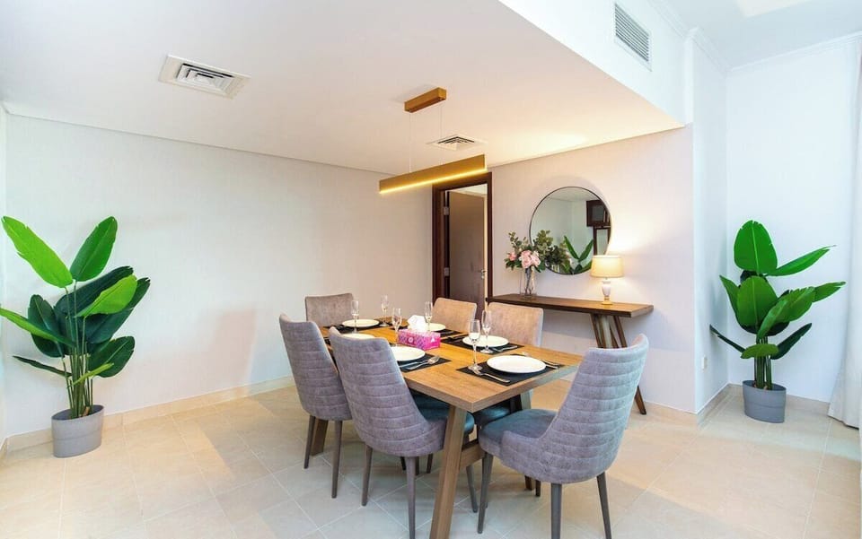 Enjoy meals together in the inviting dining area with ample seating.