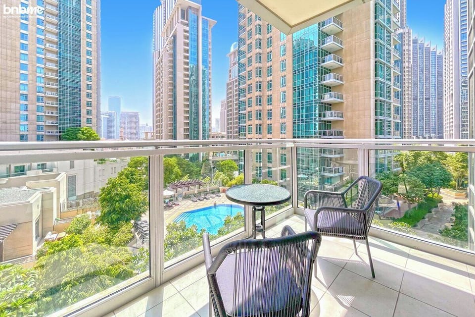 Relax and unwind on the private balcony, a peaceful retreat above the city.