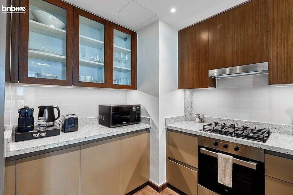 Kitchen: "Channel your inner chef in our modern kitchen equipped with all the essentials."