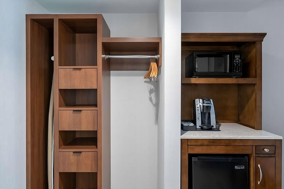 Recharge easily with in-room coffee, microwave, and storage.