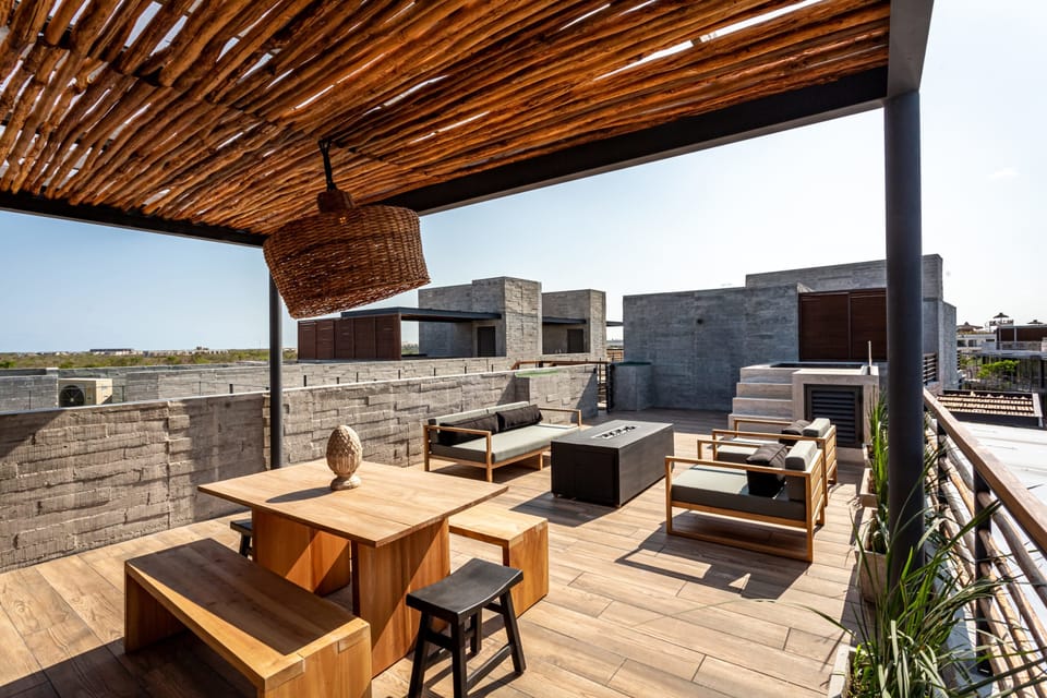 Seating for 16 with firepit and pool on roof with grilling area and outdoor kitchen. 