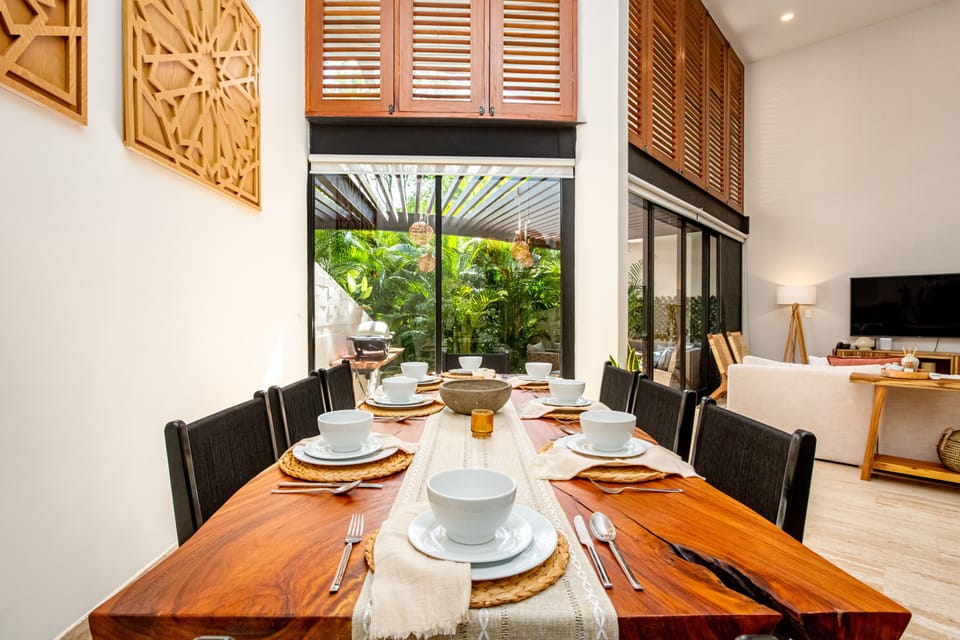 Spacious indoor dining area with seating for eight — perfect for shared meals, laughter, and gathering with loved ones.