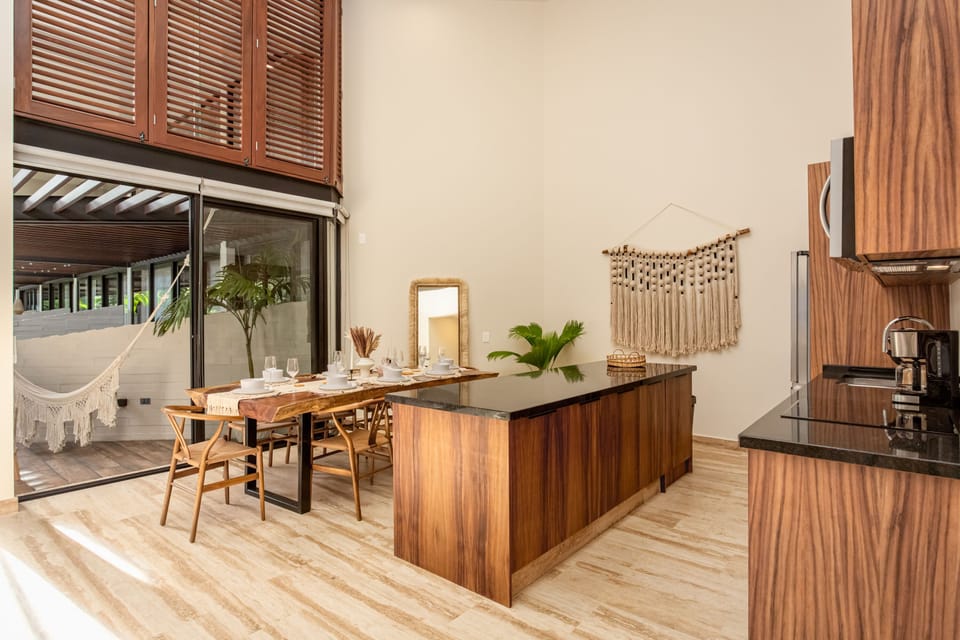 Spacious and stylish open-concept living with high ceilings and room to gather, cook, and relax in comfort.