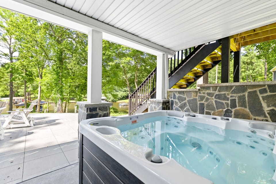Lower deck with hot tub.