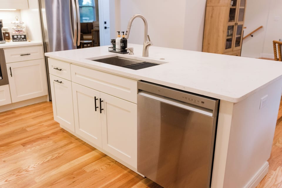 Clean sink and dishwasher - making cleanup easy after meals.
