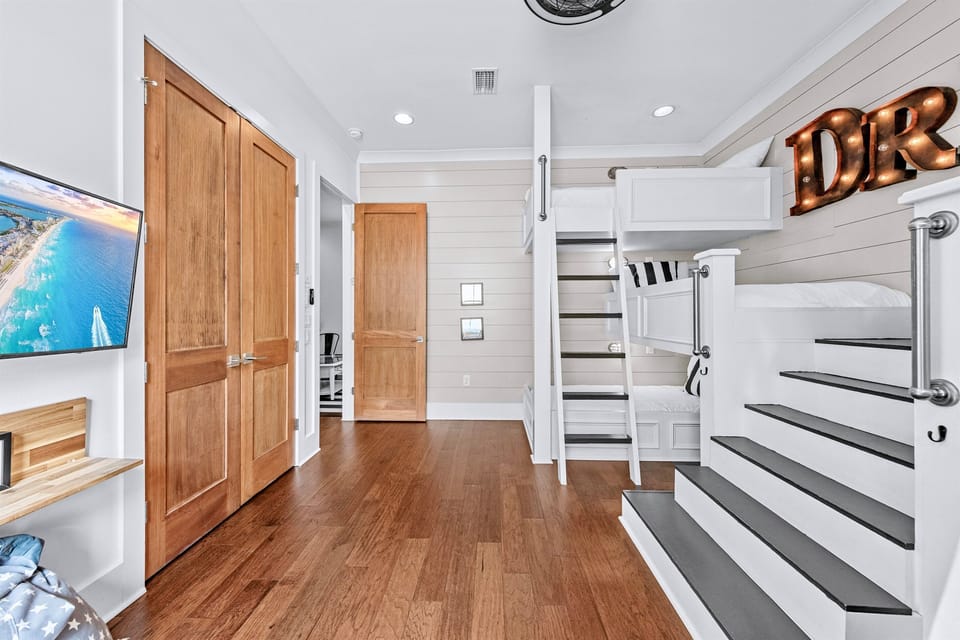 2nd Floor – Bunk Room with 6 twin beds and private bathroom. Kid-friendly retreat with space, comfort, and fun, ideal for families booking Miramar Beach vacation rentals just steps from the Gulf.
