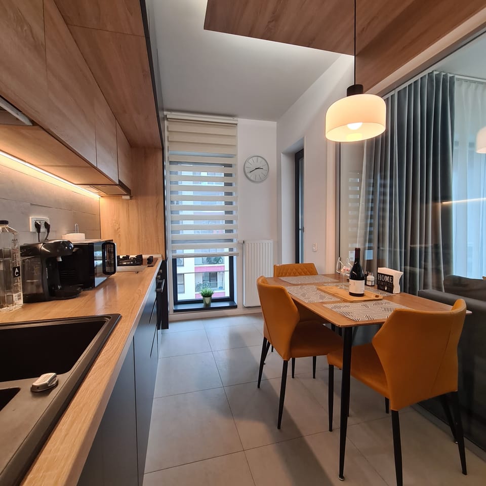 Enjoy home-cooked meals or wine nights in this bright dining space.