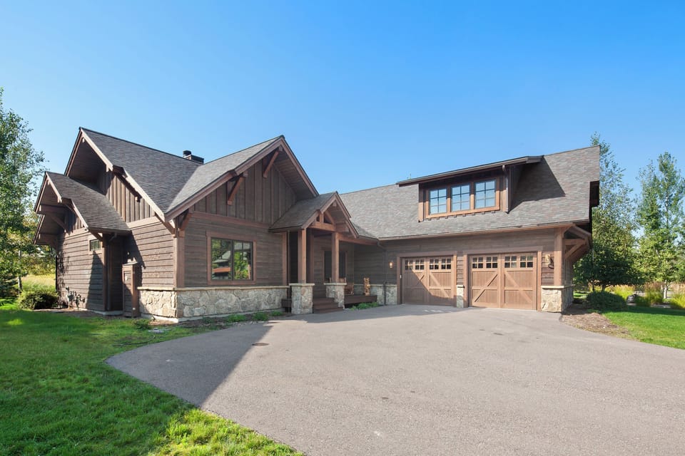 Arrive to a handsome mountain home with easy driveway access.