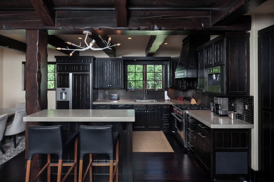 Cook together in the sleek kitchen with spacious island seating.