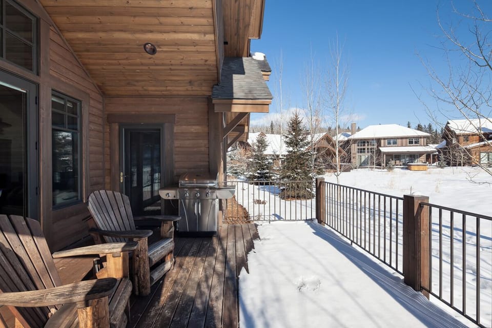 Sip coffee on the private deck with grill and snowy vistas.