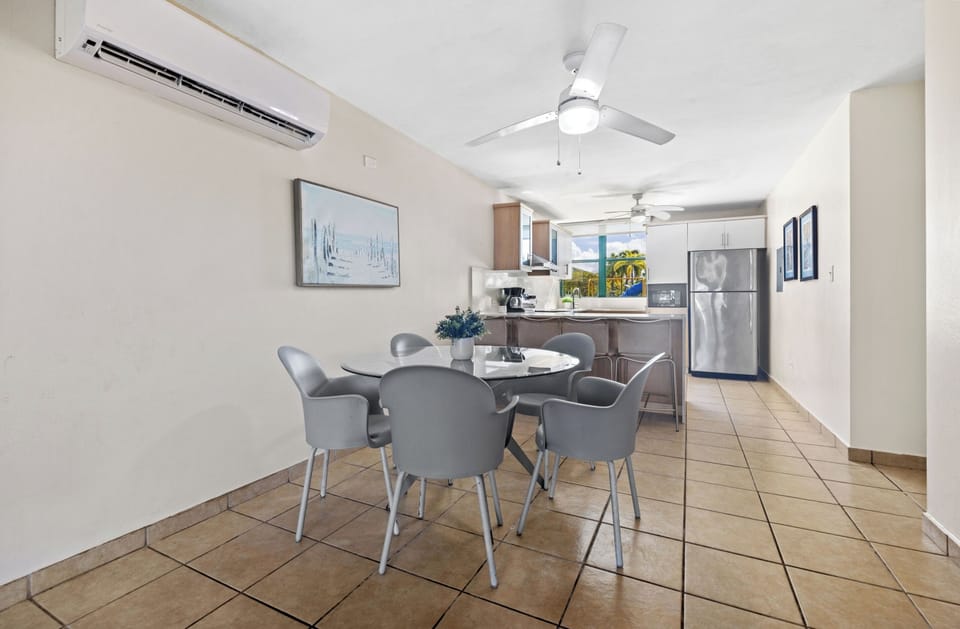 Modern open-plan kitchen and dining area for a seamless experience.

