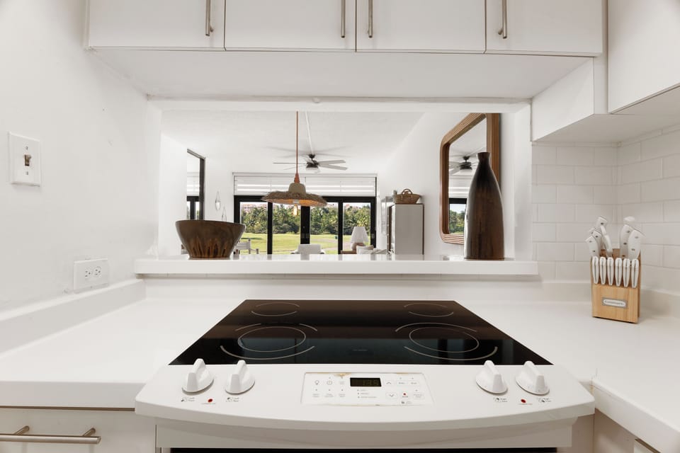 Cook your favorite meals in this modern, fully equipped kitchen with ample space.

