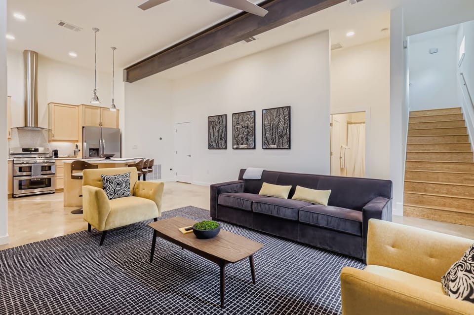 Open-concept layout that flows seamlessly from living room to kitchen.