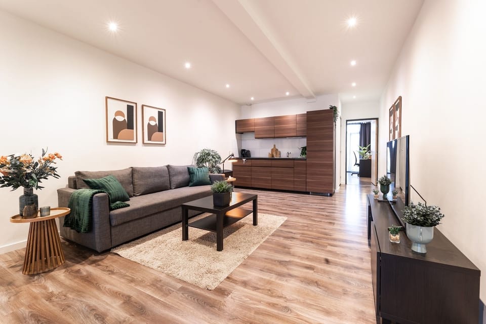 Living room with comfortable sofa and Smart TV