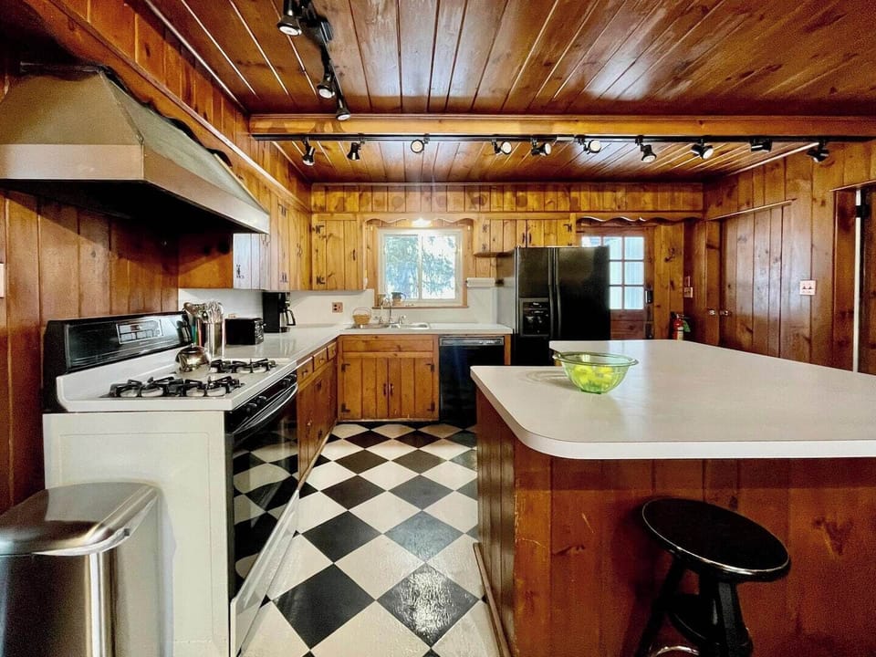 This retro kitchen is outfitted with all your cooking and baking needs. 