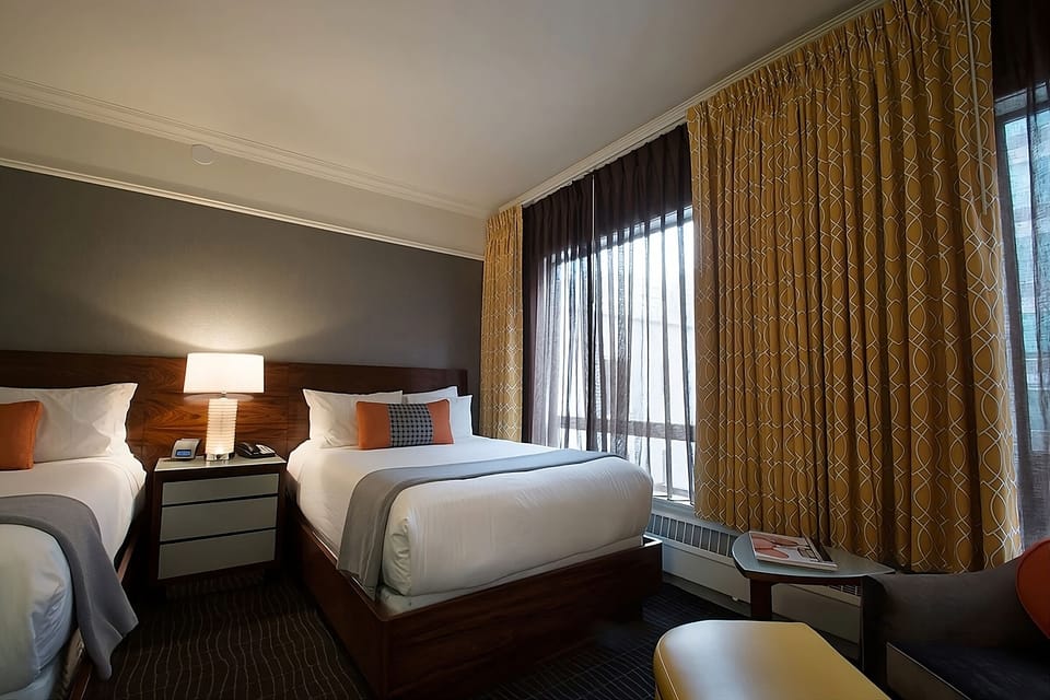 Unit with 2 Double beds. Exact unit will be assigned upon arrival. Views, colors and decor may vary.