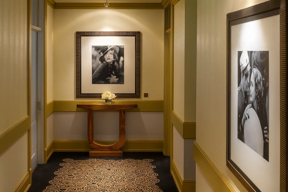 Stroll quiet corridors framed by classic art and warm lighting.