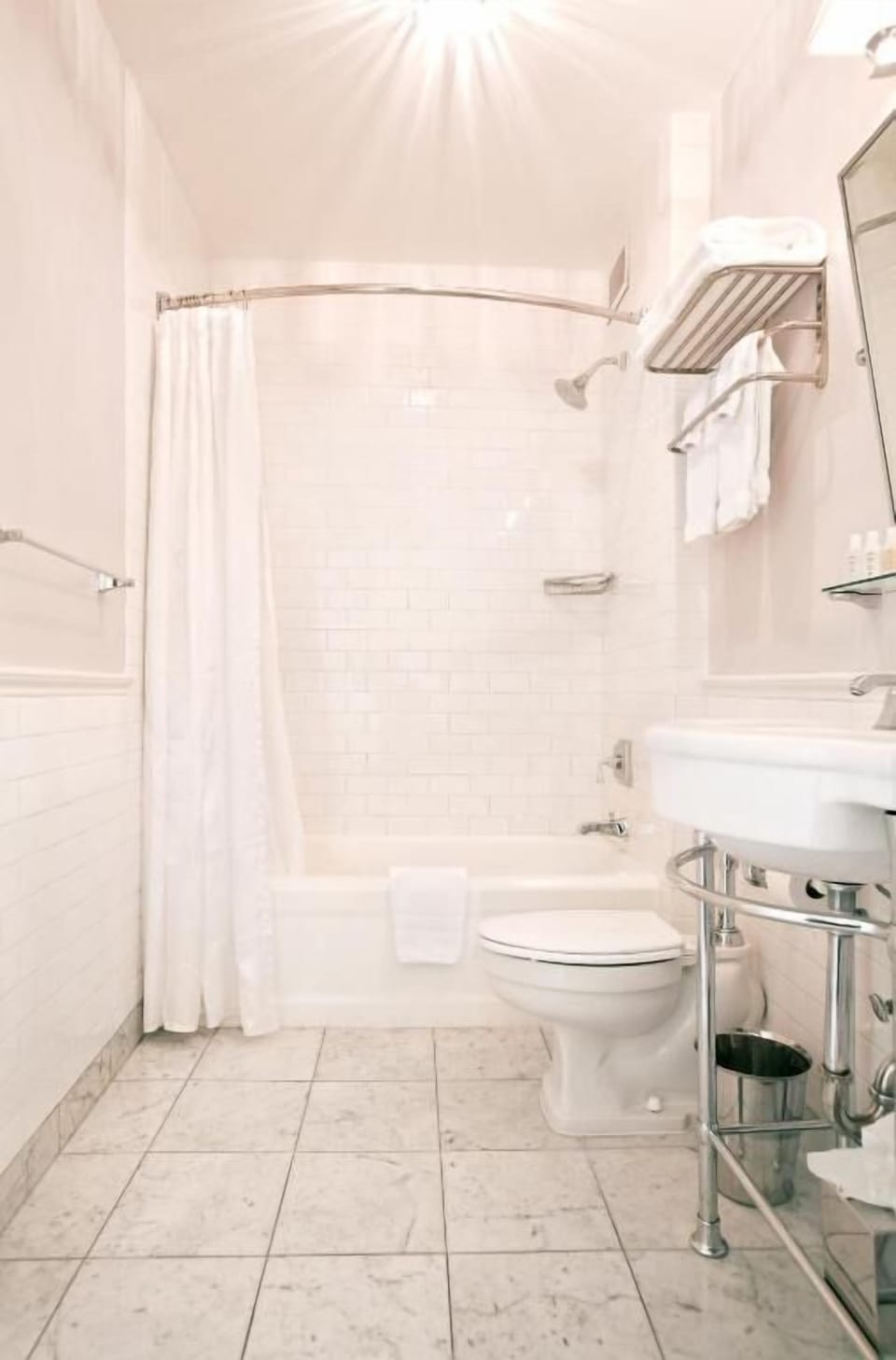 Refresh in a spotless bathroom with bright, spa-clean finishes.