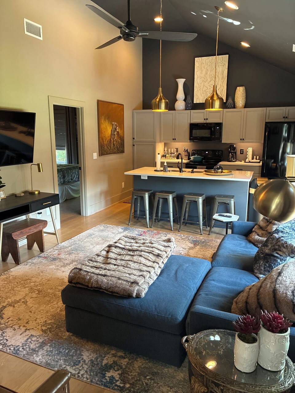 Large open living-kitchen w/ flat screen TV