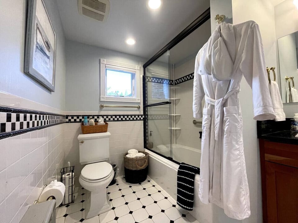 Full private bathroom with tub and shower.