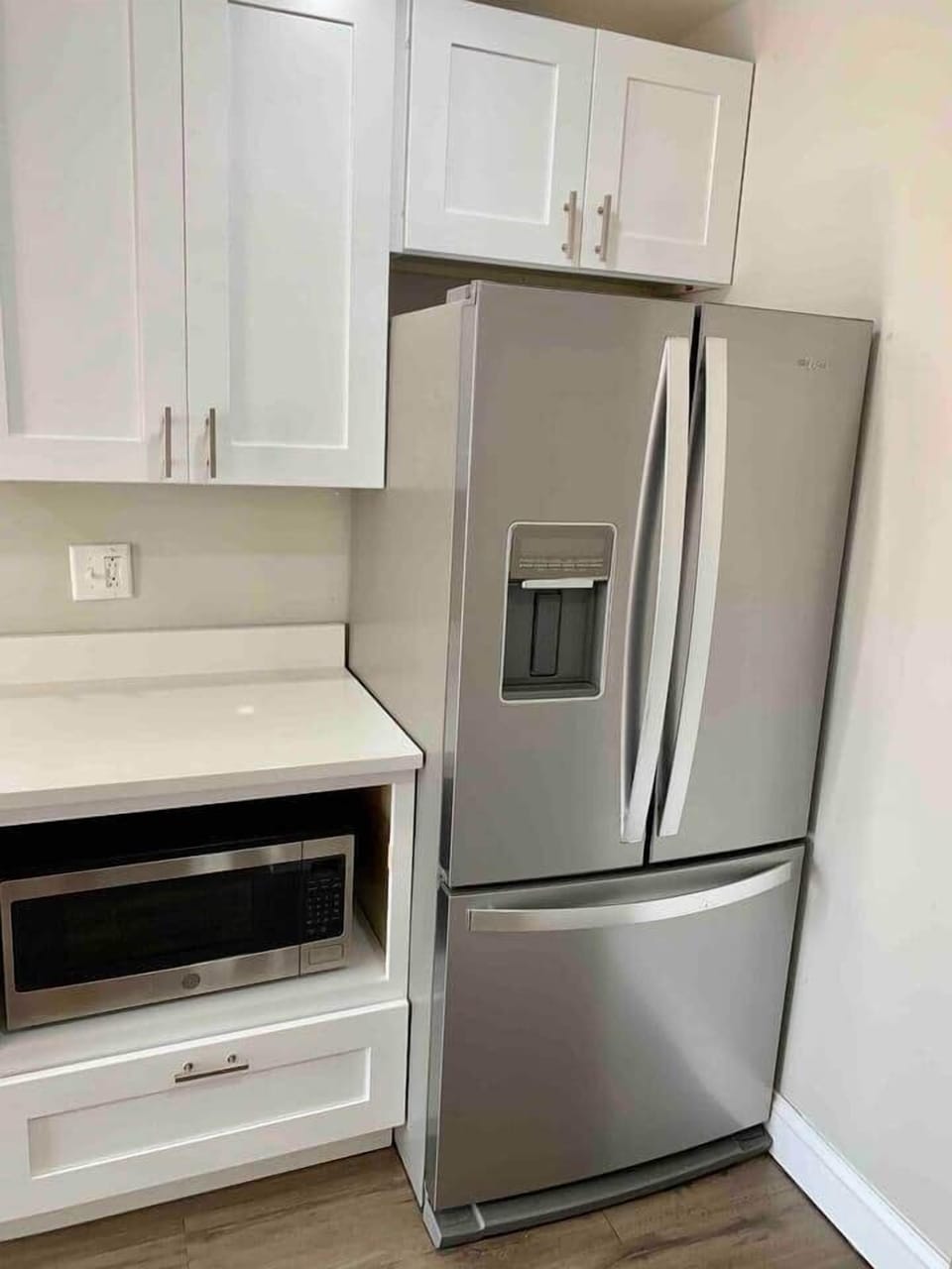 New full size refrigerator with ice and water.