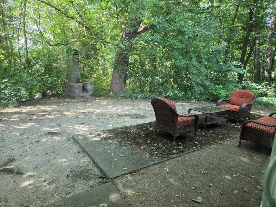 Efred's outdoor patio with fireplace overlooking the beautiful St. Joseph river