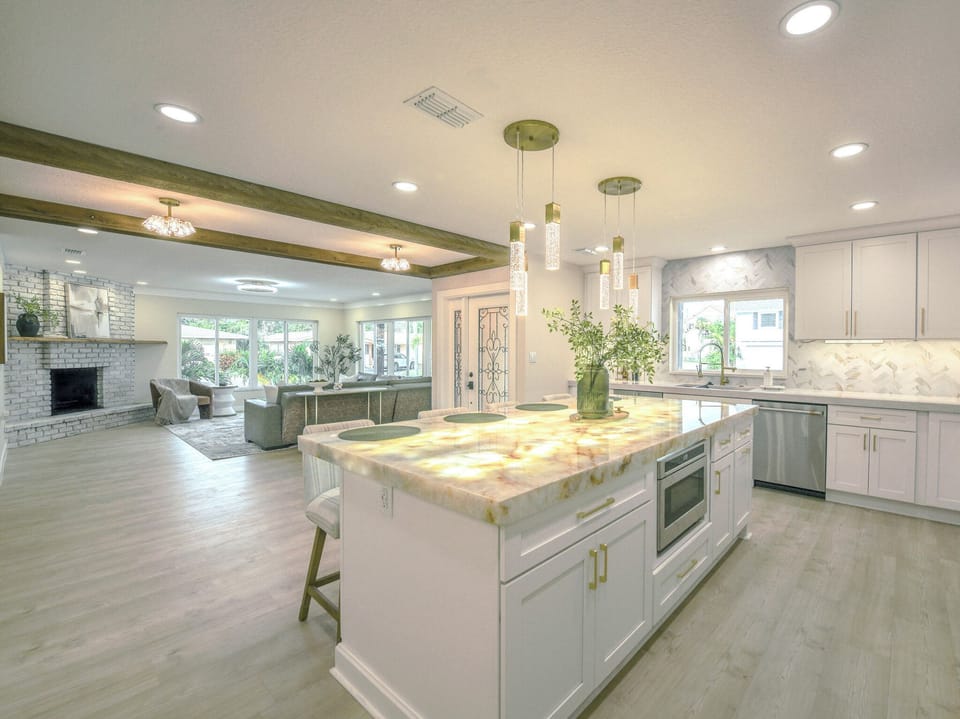 Wide open flow with kitchen, living room, & dining room all connected. 