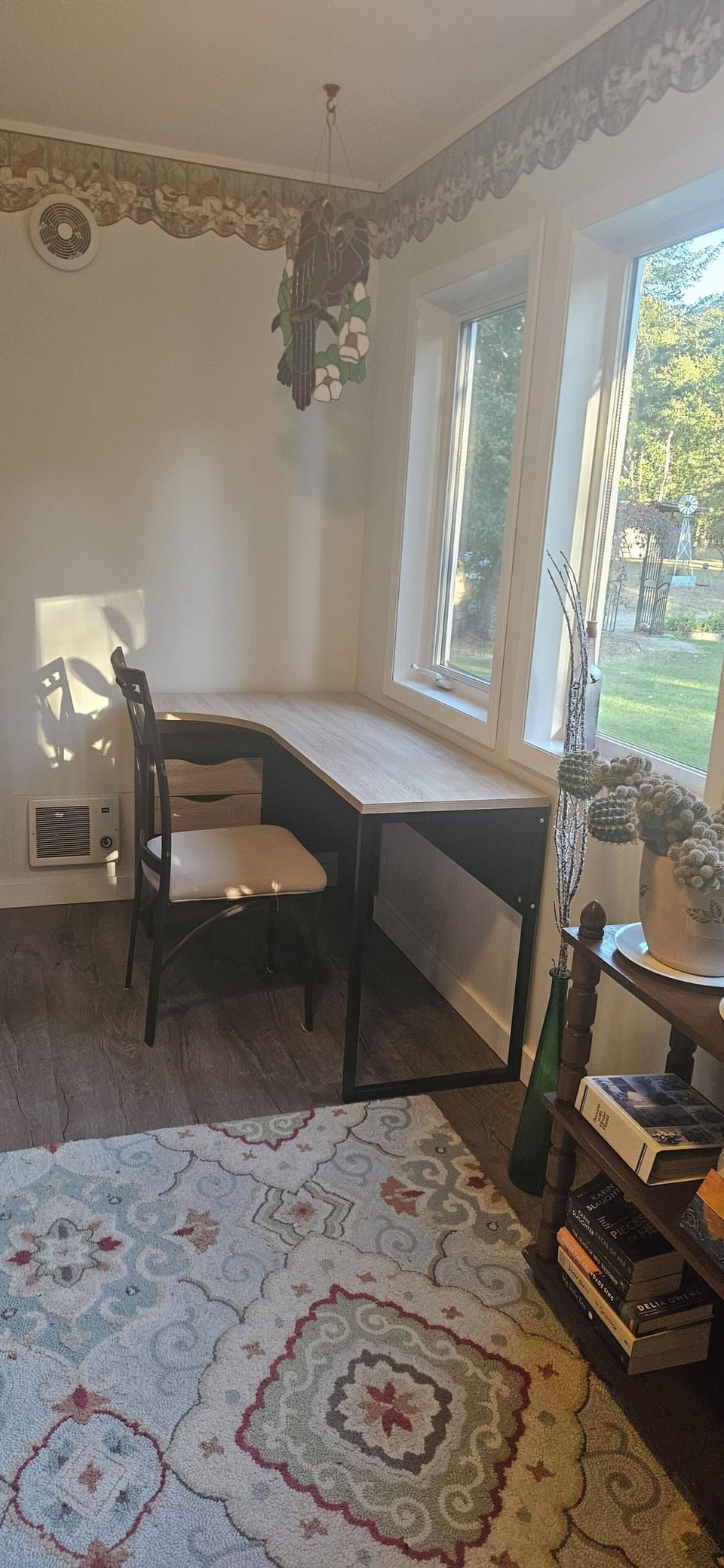 Desk in sunroom.
