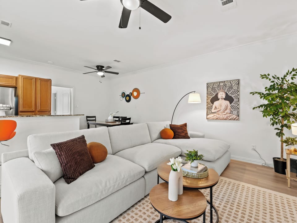 Step into a bright, open-concept living area that blends comfort and elegance.