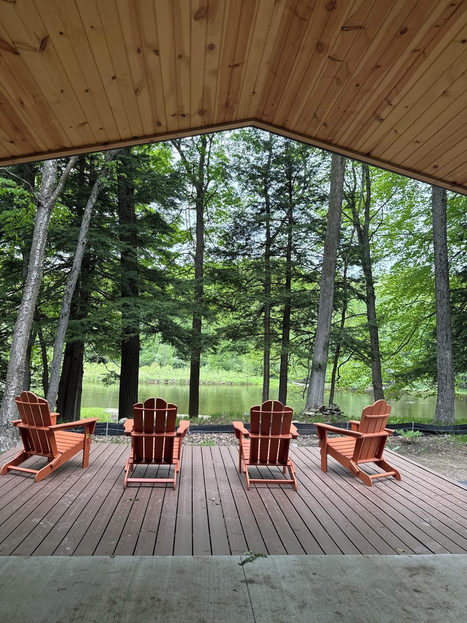 Covered porch and deck overlooking the Muskegon River.