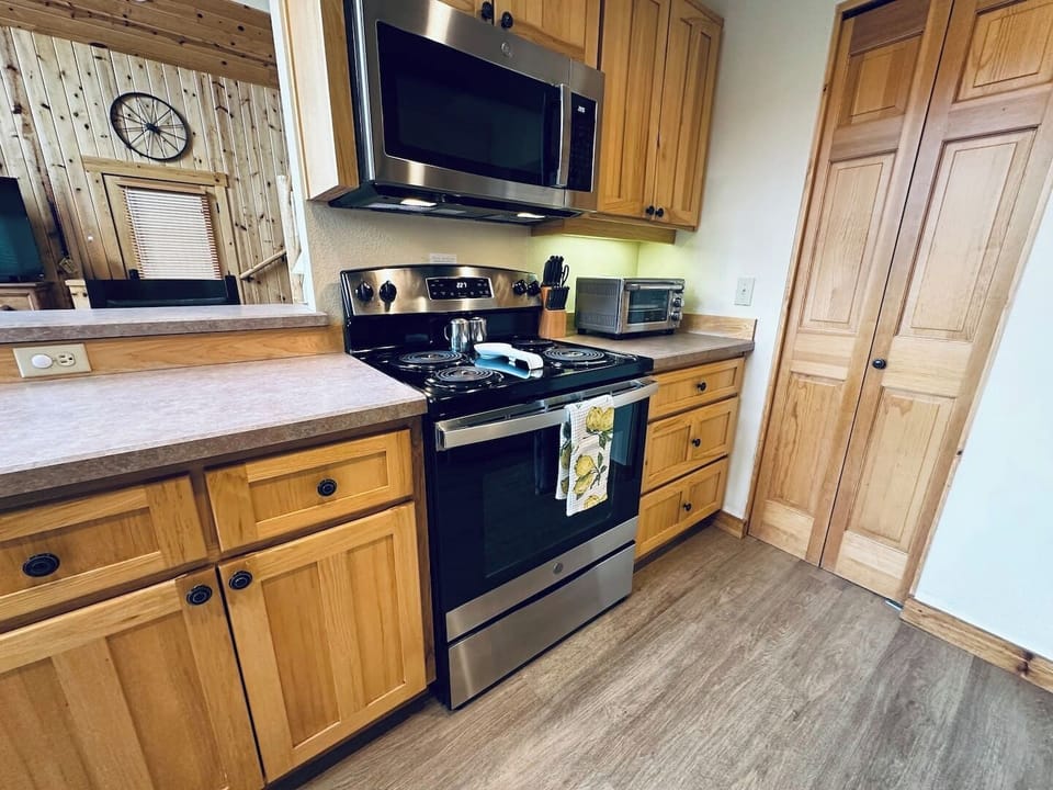 full kitchen with new appliances, fridge and all the necessities to cook a family meal