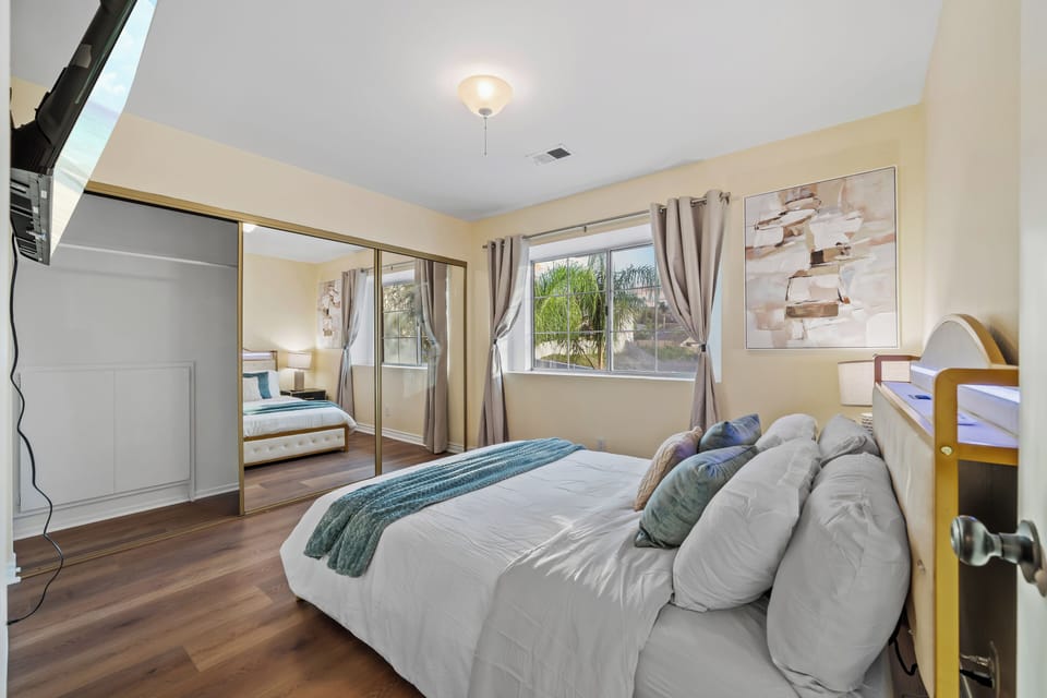 Spacious bedroom with plenty of storage.