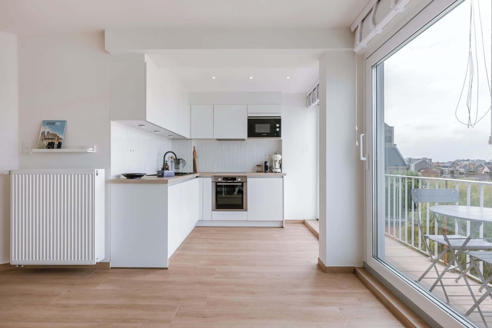 Open kitchen with balcony view