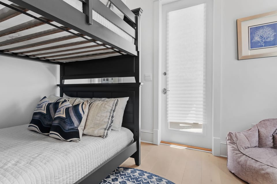Bedroom 4 features a twin bunk bed and ensuite bathroom. (Bluewater Bliss)