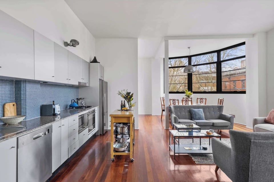 Open plan living at its finest, where the kitchen flows seamlessly into the lounge for cooking, dining and unwinding together.