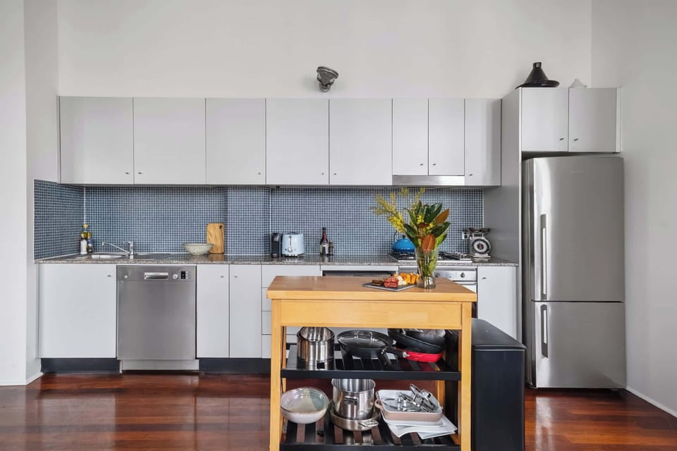 A fully equipped kitchen with fridge, stove and dishwasher, designed for effortless cooking and easy clean-up.