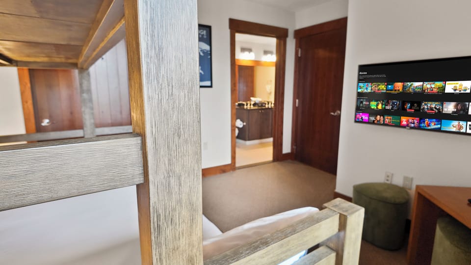 Family-friendly room with entertainment setup and warm lighting