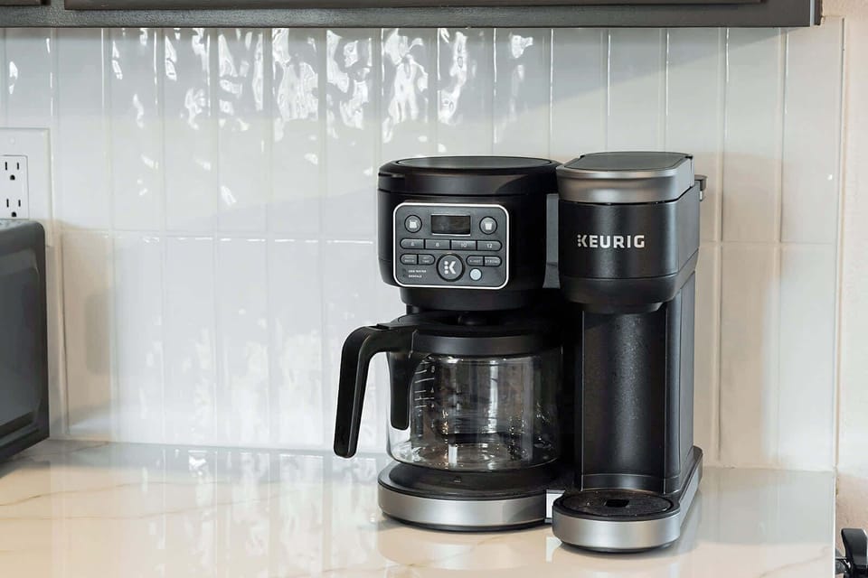 Keurig Duo that does pods & full pots of coffee. Coffee provided