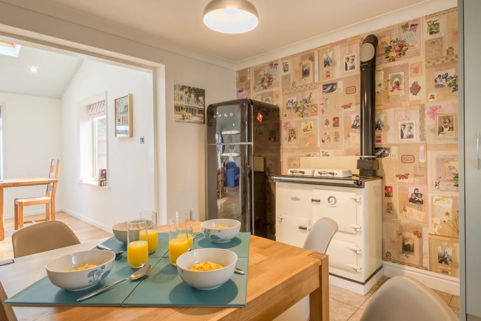 Bosky House, South Creake:  Kitchen with large Smeg fridge/freezer and decorative Rayburn