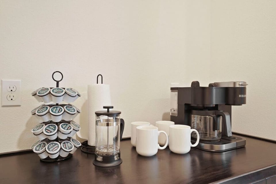 Stocked coffee bar just off kitchen