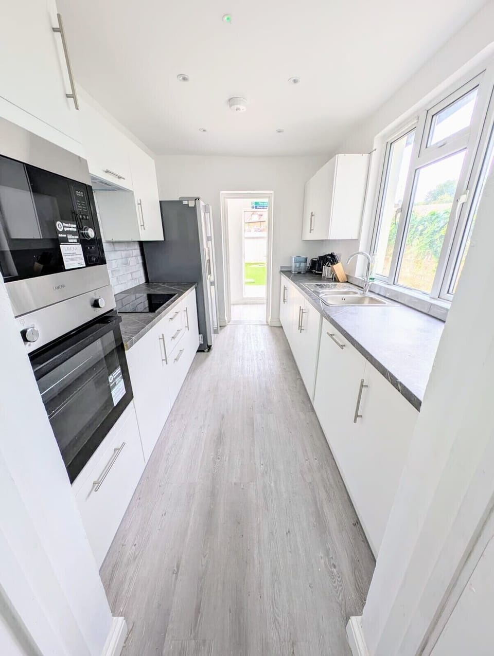 Stay in a stunning new conversion, featuring brand-new fittings and a stylish, modern design. A chic breakfast bar adjoining the modern kitchen to the rear provides the perfect spot for casual dining or catching up on emails.
