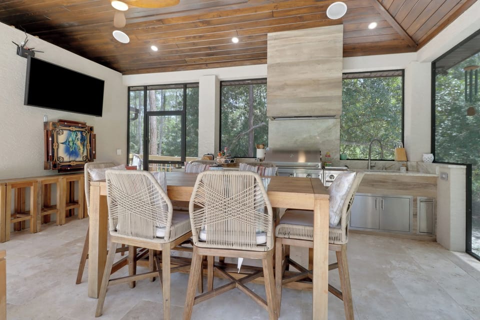Enjoy the large TV w/ surround-sound speakers, or play at the Dominoes table.