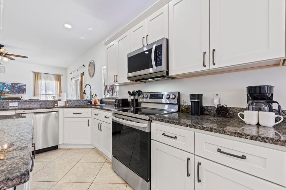 Kitchen Space – Ample counter space and full-size appliances for easy family cooking.