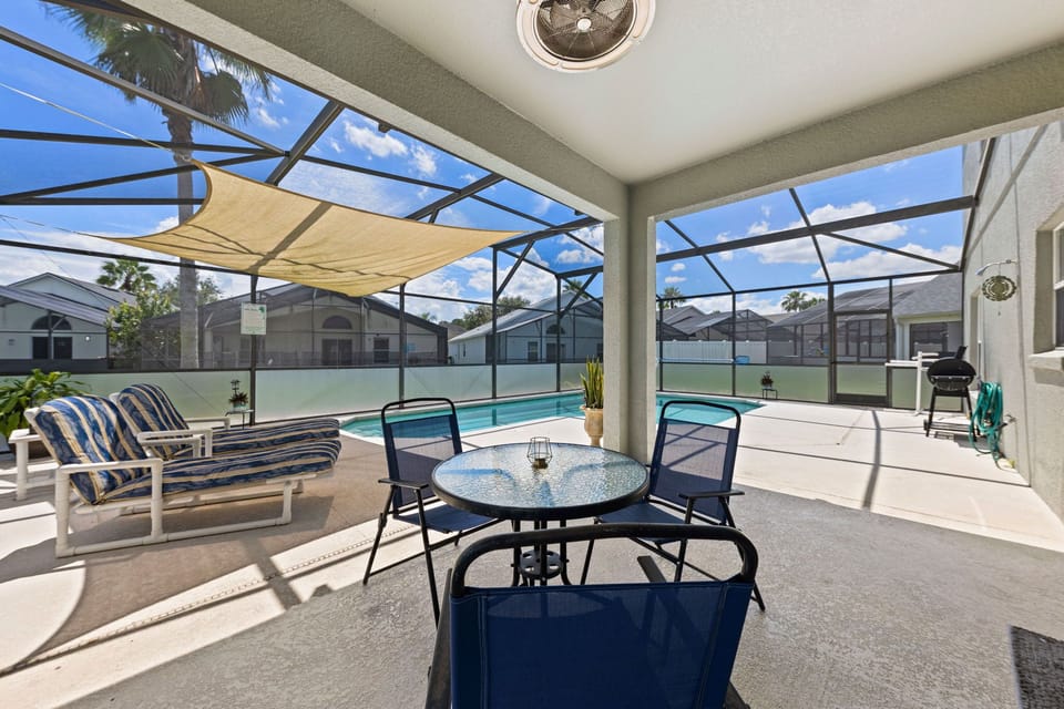 Outdoor grill and dining space for family barbecues and evening relaxation.