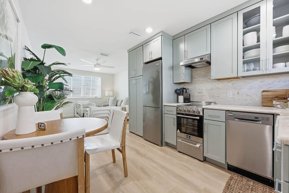 Full kitchen and eating area to enjoy after a long day at the beach