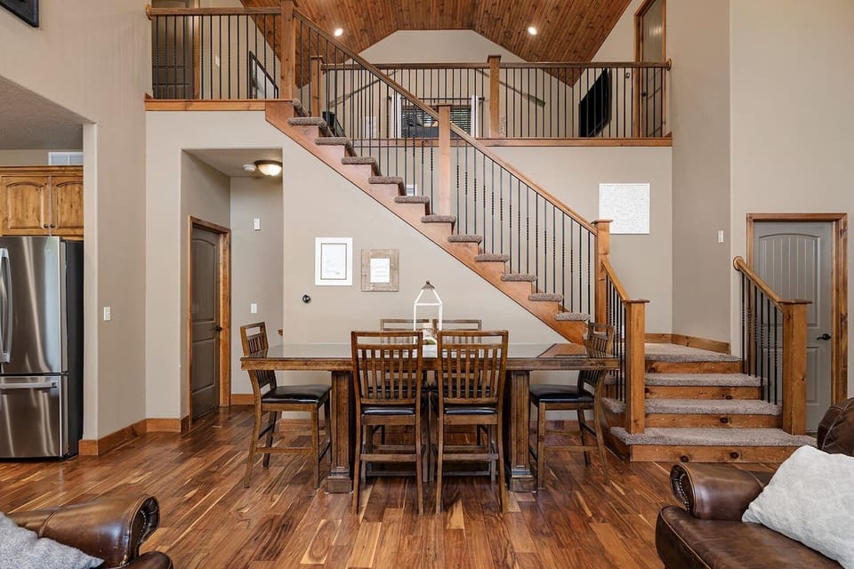 Large dining table with seating for 10, 4 more at the island, and a small dining table with seating for 3 for 17 total