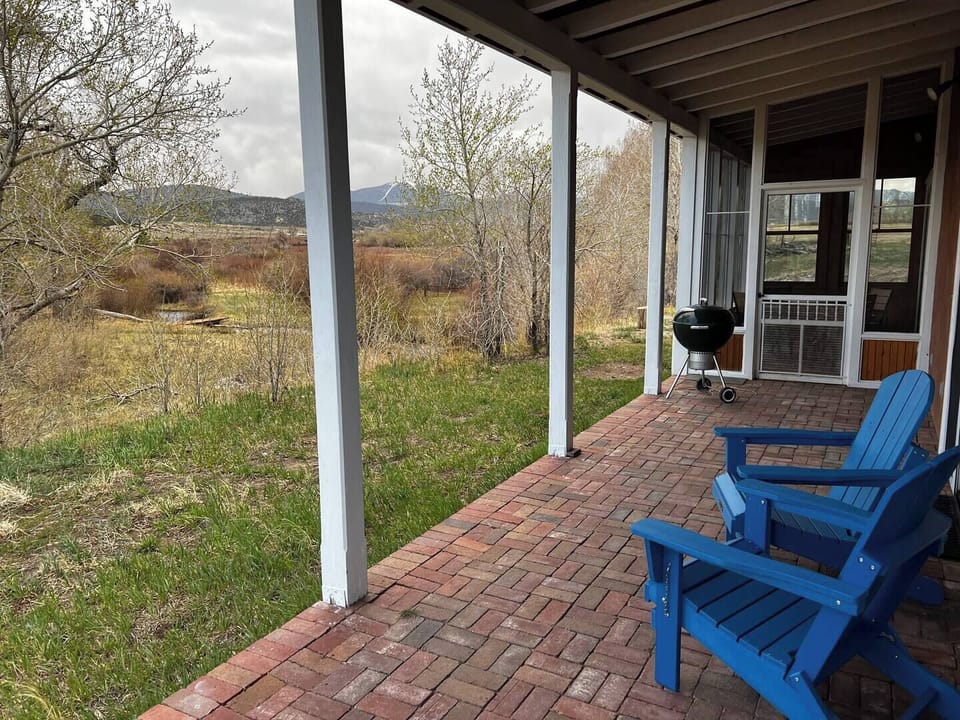 Back porch with view of Huerfano River.