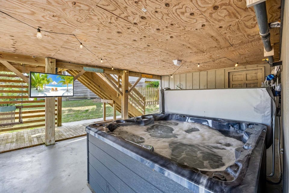 Relax in the covered bubbly Hot Tub!