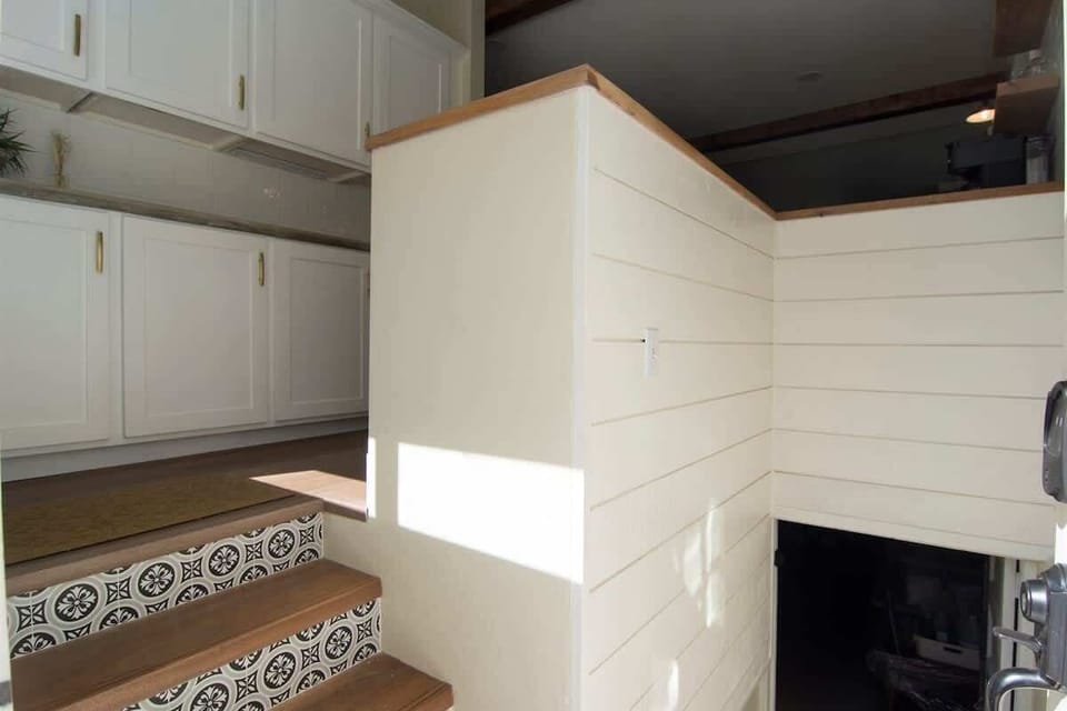 Entrance - requires stairs. Basement is locked with owner's items.